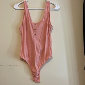 Coral color bodysuit, size XL
